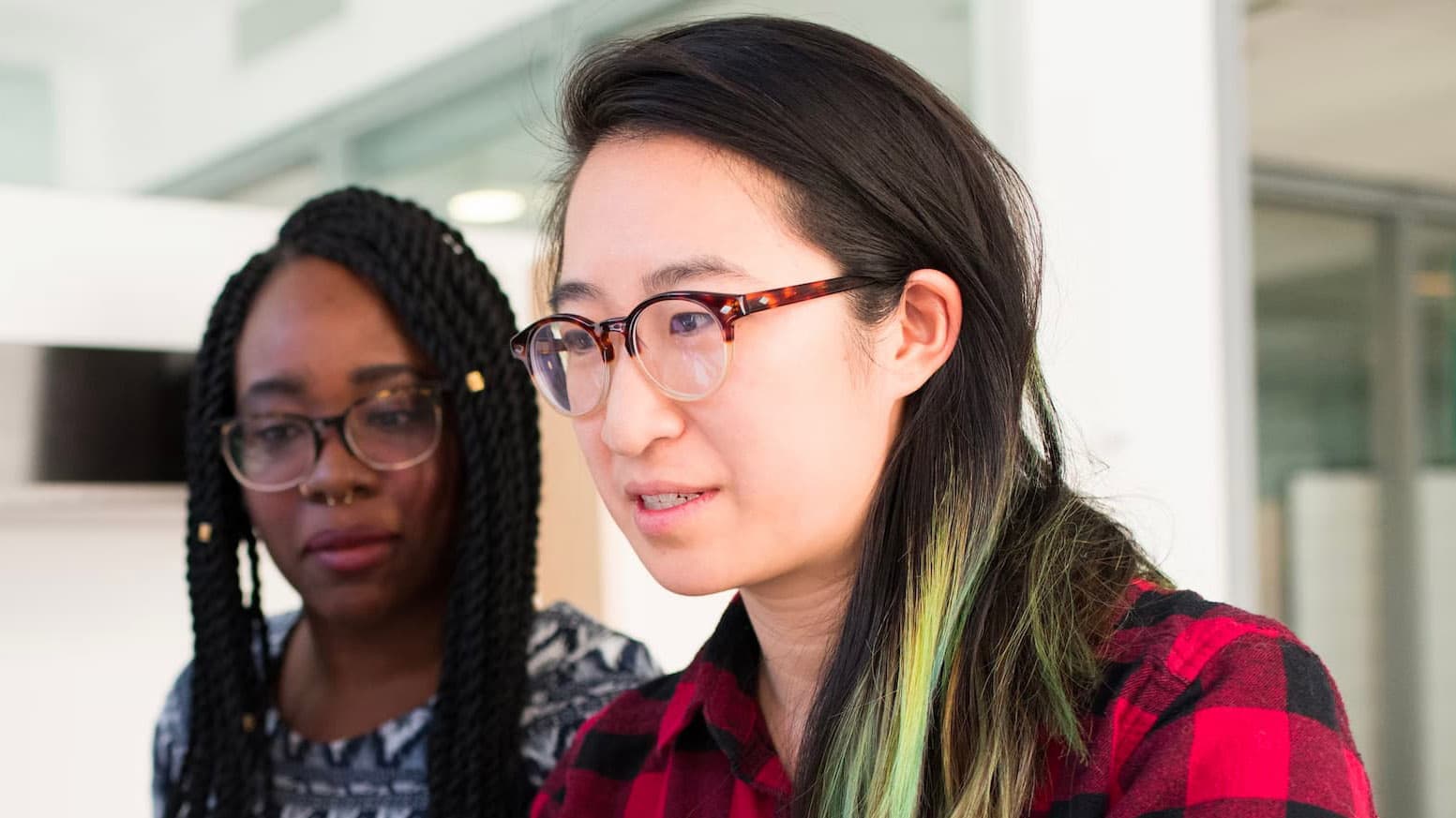 Tao Hansen at work with a colleague